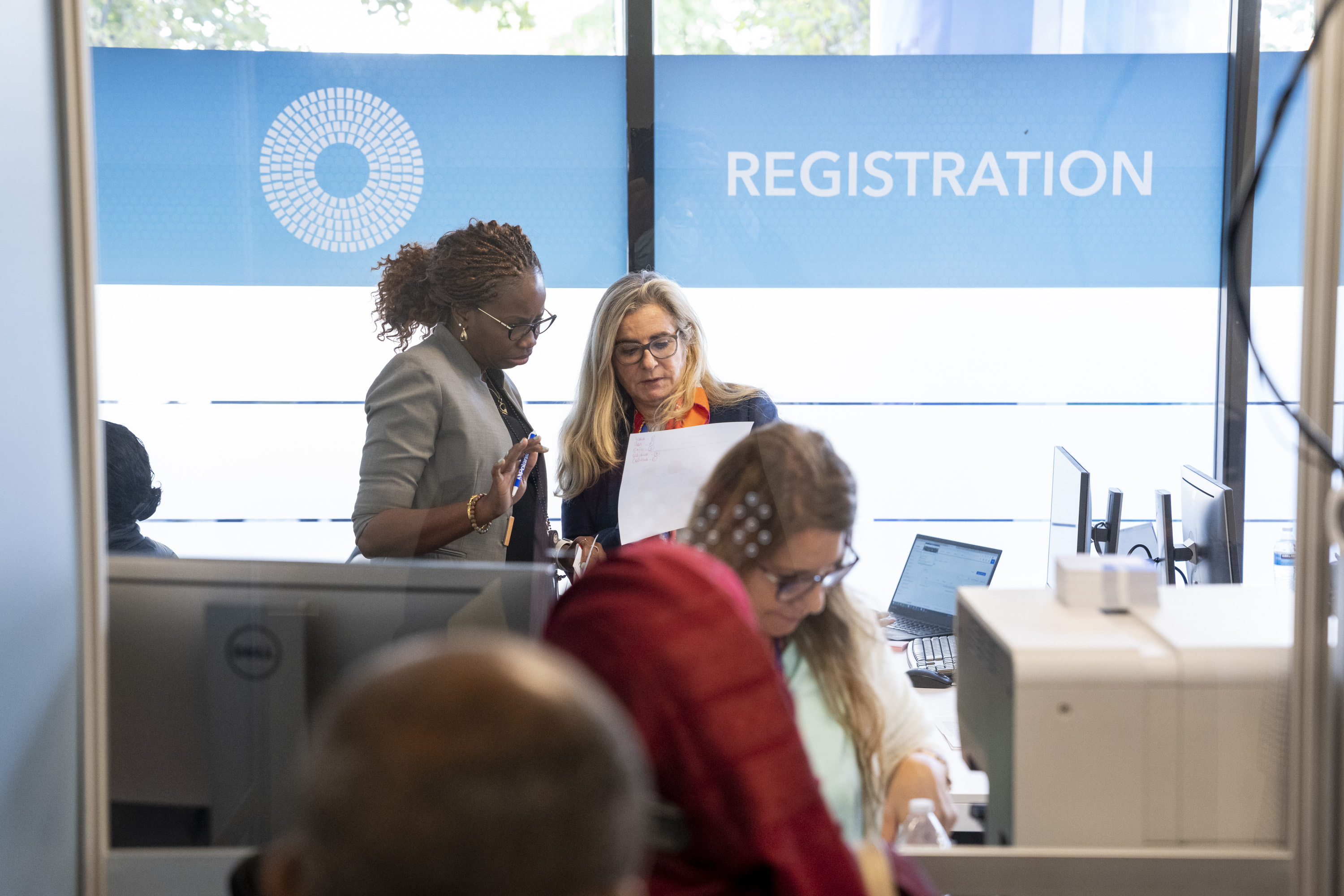 Attendees complete their registration during the 2022 Annual Meetings at the International Monetary Fund.IMF Photo/Cory Hancock10 October 2022Washington, DC, United StatesPhoto ref: CH221010037.arw